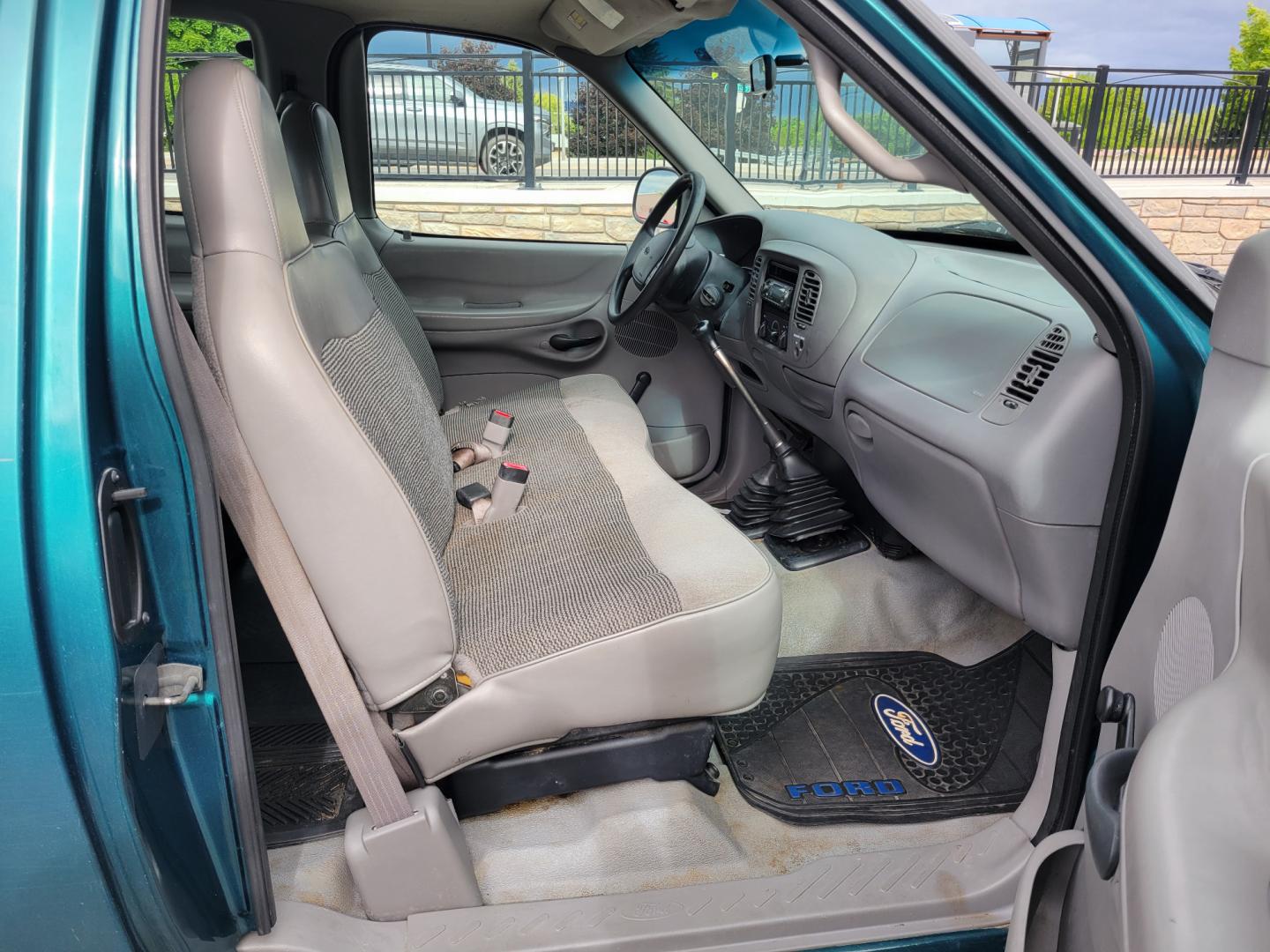 1997 Green /Tan Ford F-250 (1FTFX2866VK) with an 4.6L V8 engine, 4 Speed Manual with Overdrive transmission, located at 450 N Russell, Missoula, MT, 59801, (406) 543-6600, 46.874496, -114.017433 - 4.6L V8 Engine. 4 Speed with Overdrive Manual Transmission. 4 Wheel Drive. 3 Door. Short Box. Air Conditioning. Cruise Control. Financing is NOT Available. - Photo#8